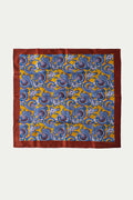 Brown silk men's scarf featuring a paisley pattern, viewed from above