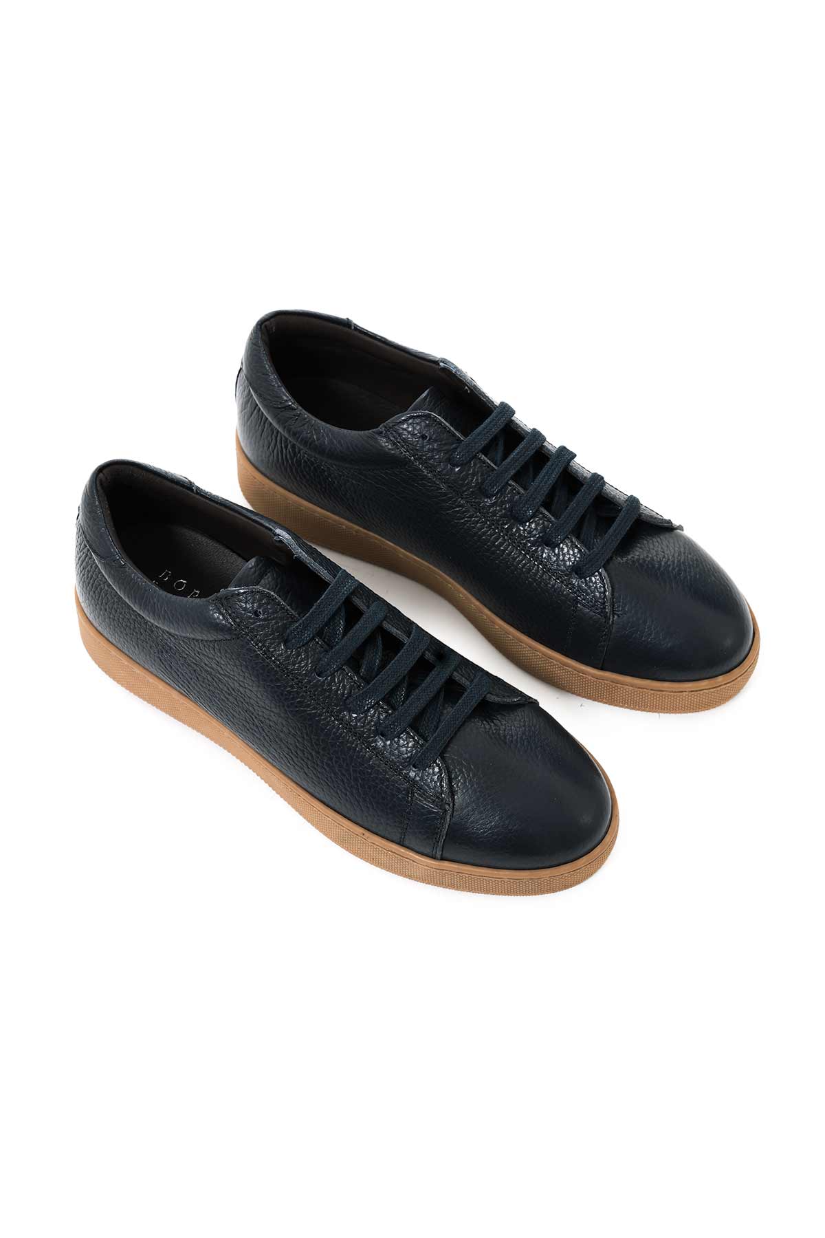 Sneakers in pelle bottolata