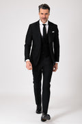 Black formal dress with a plunging neckline