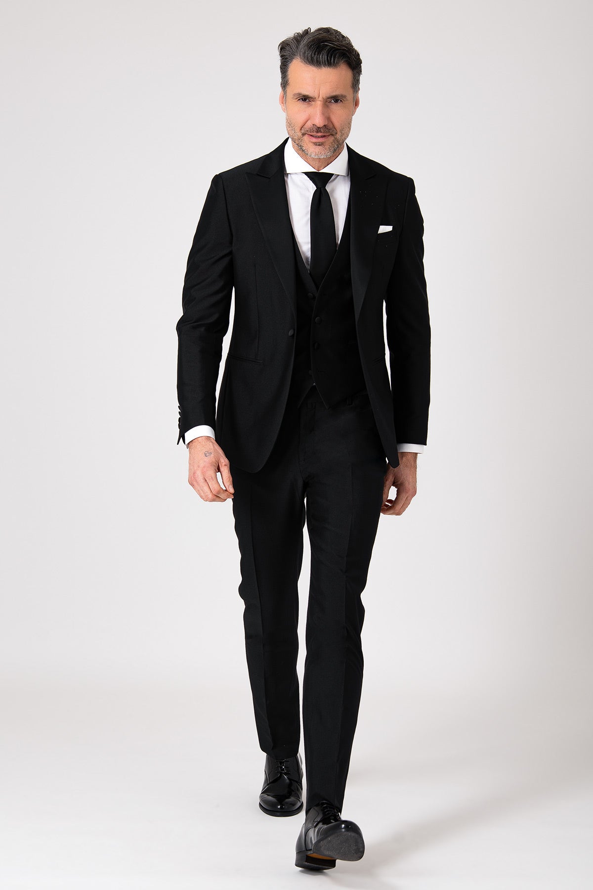 Black formal dress with a plunging neckline