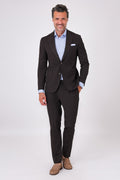 Front view of a dark brown two-piece suit with patch pockets on a model
