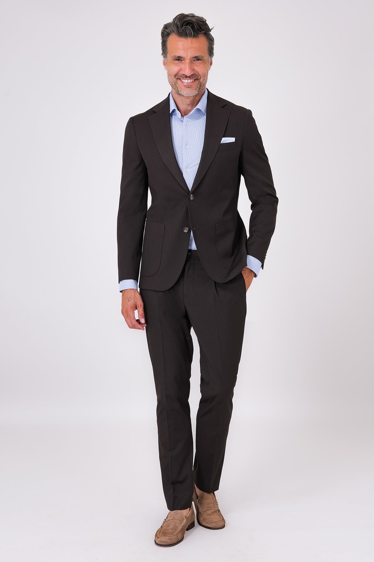 Front view of a dark brown two-piece suit with patch pockets on a model