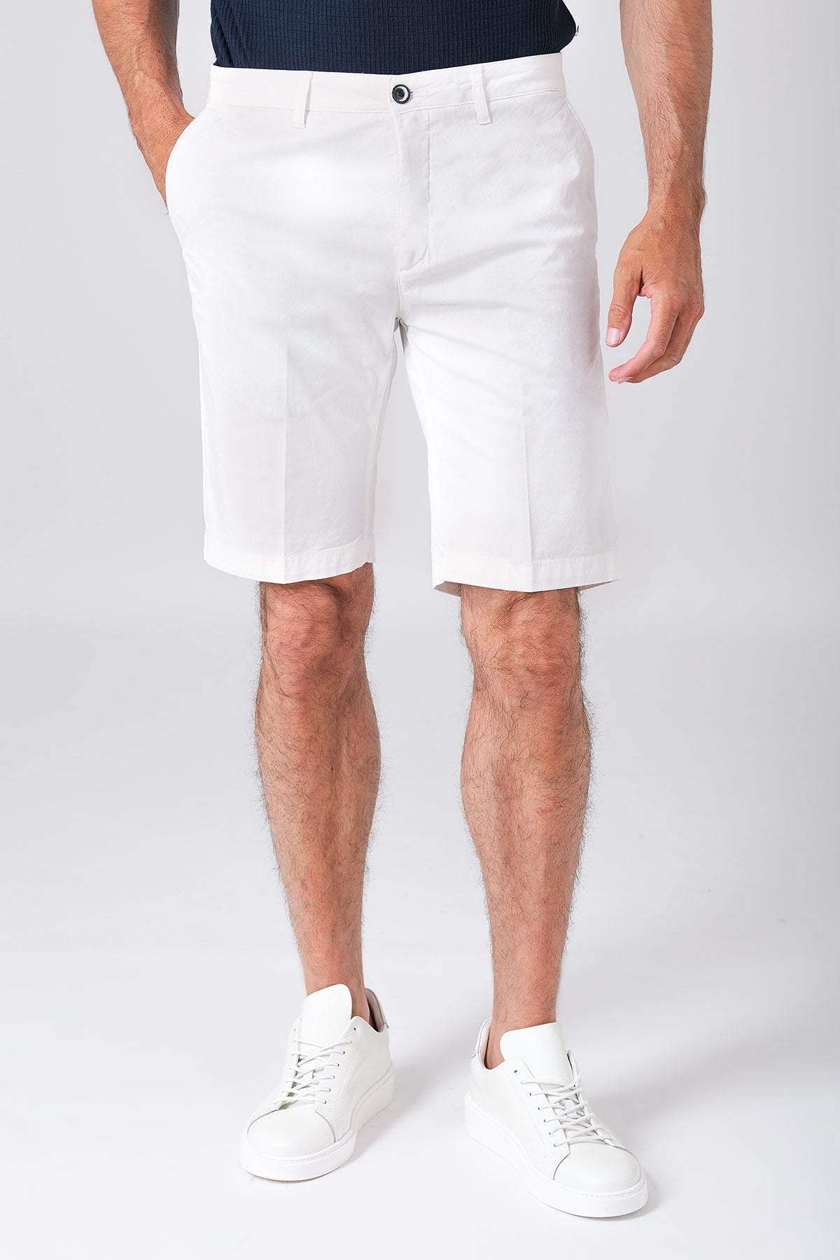 Basic cotton stretch Bermuda shorts in cream, shown from the front