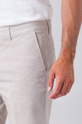 Basic cotton stretch Bermuda shorts in sand, showcasing technical details