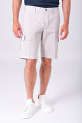 Front view of sandy beige stretch cotton cargo Bermuda shorts