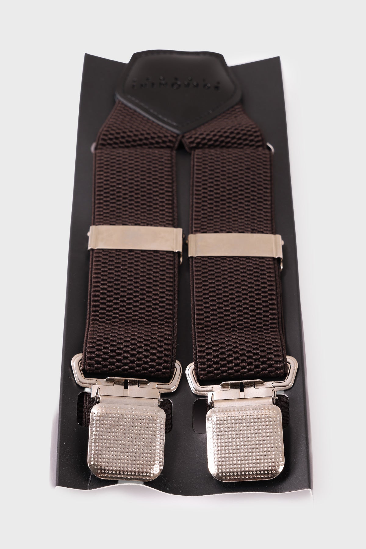Brown braces with embossed geometric pattern, adjusters and metal clips