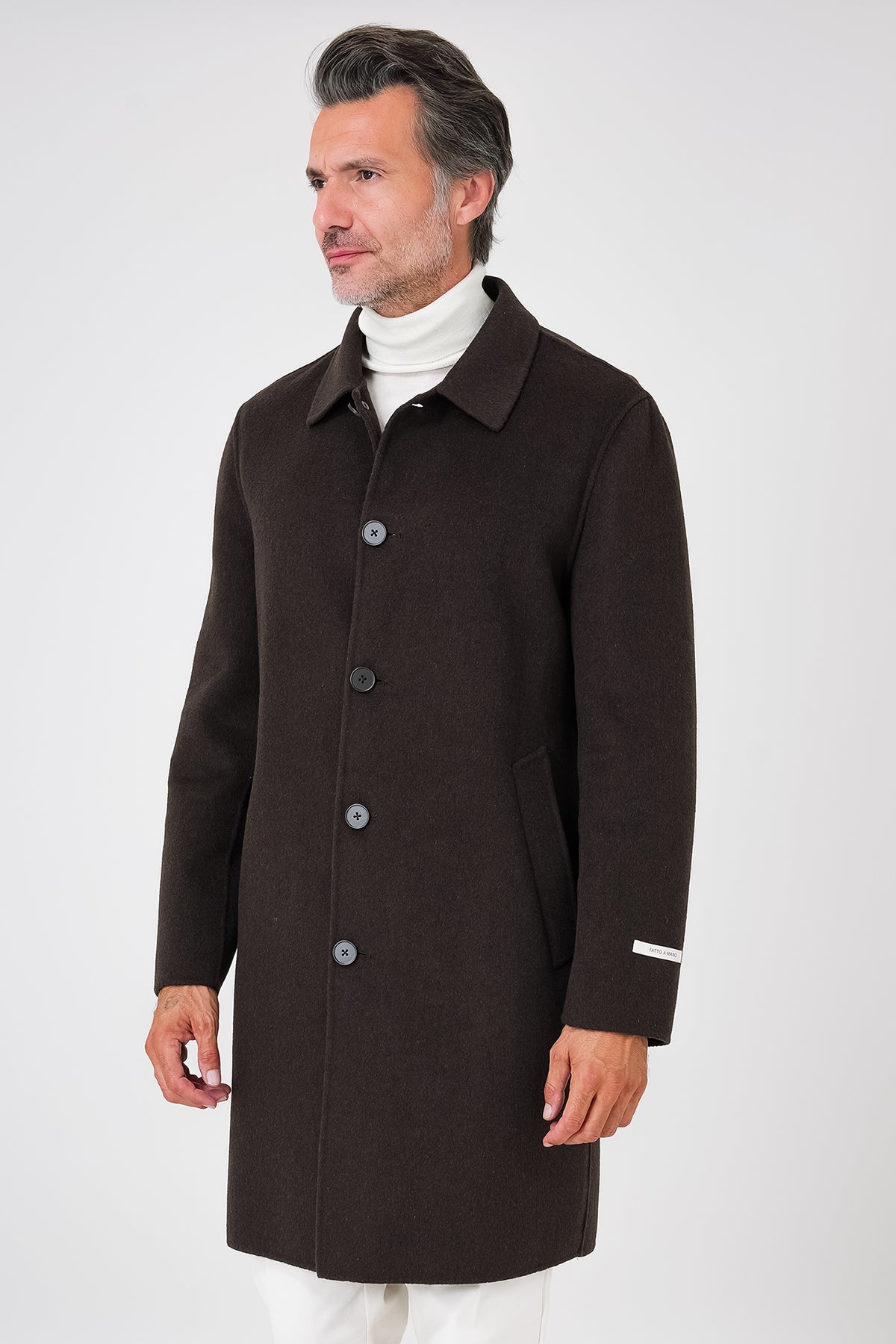 Dark brown double-faced coat with a shirt collar and button fastening, on a model