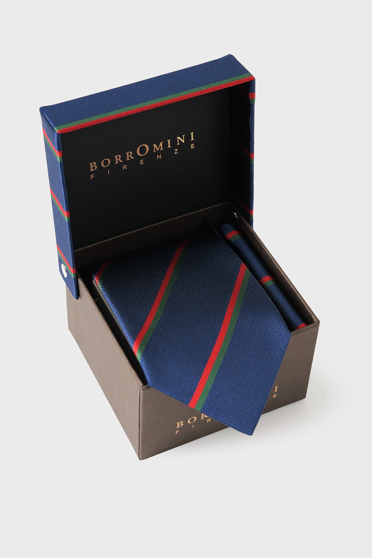 Set cravatta e pochette in seta multicolore a righe nella confezione aperta