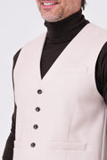 Front detail of beige herringbone waistcoat with V-neck and buttons