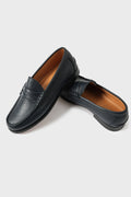 Pair of classic blue leather loafers with penny strap