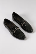 Patented leather penny loafers in black - side view