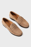 Top view of men's suede loafers with classic penny strap