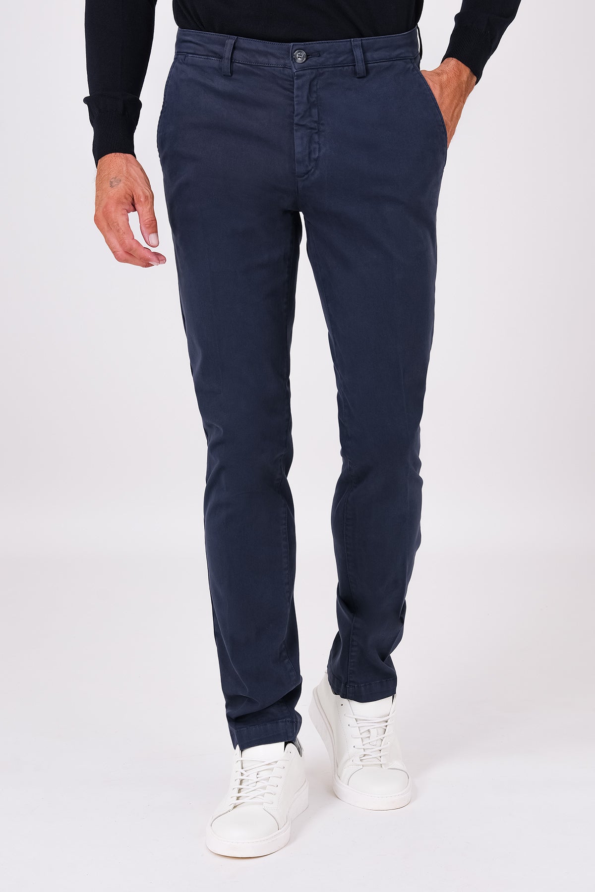 Front view of basic blue stretch cotton trousers on a model