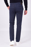 Rear view of blue stretch cotton trousers on a model