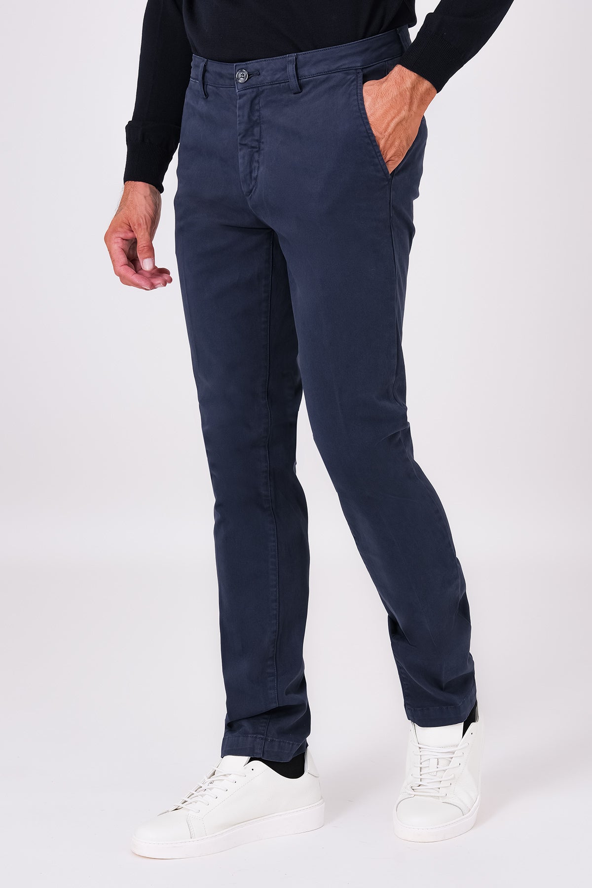 Front view of blue stretch cotton trousers on a model