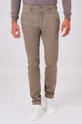 Front view of basic mud brown stretch cotton trousers on a model