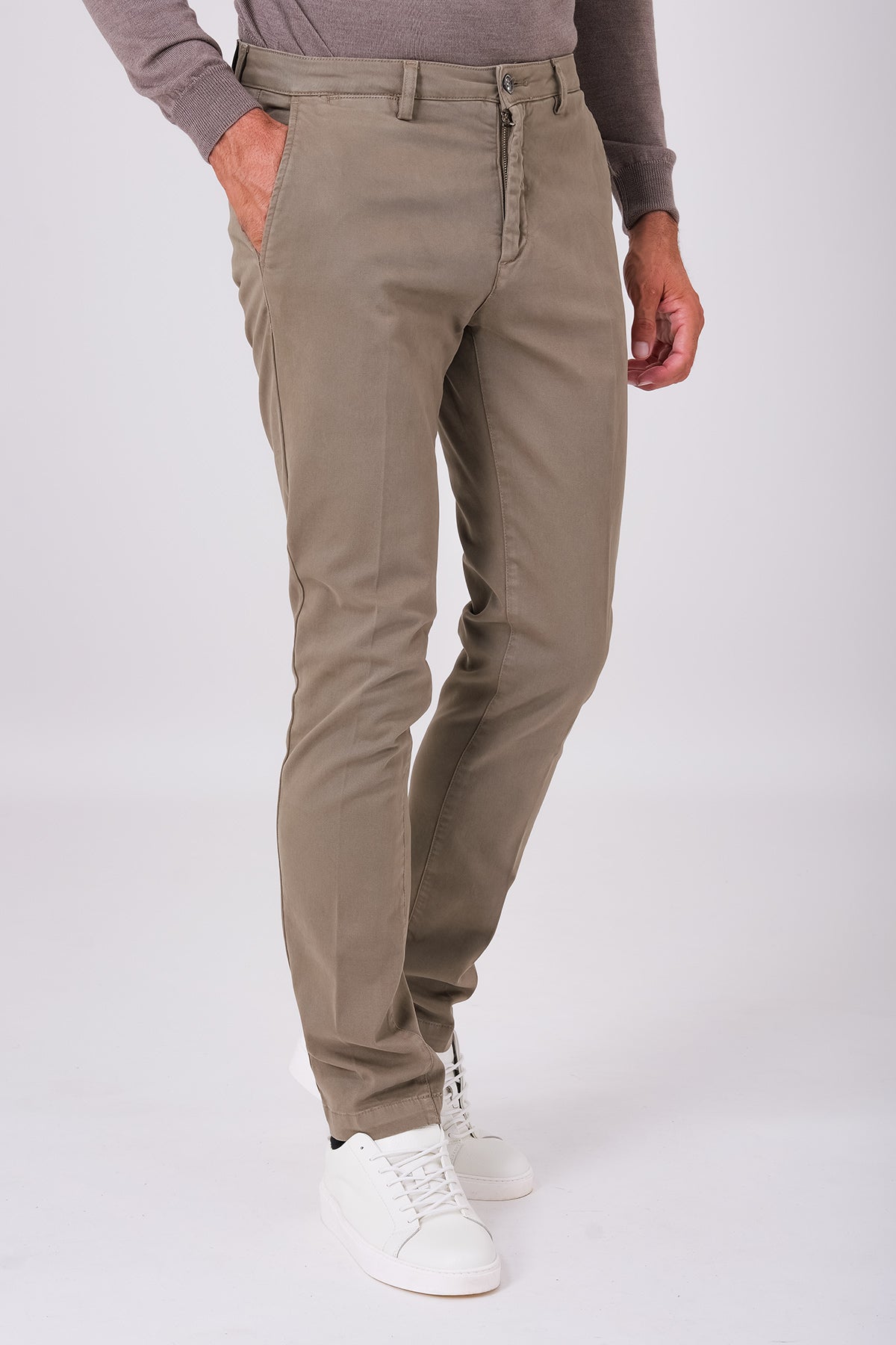 Mud brown stretch cotton trousers on a model, front view