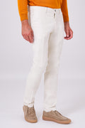 Basic cream stretch cotton trousers on a model, front view