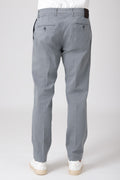 Man wearing grey stretch cotton pants, back view