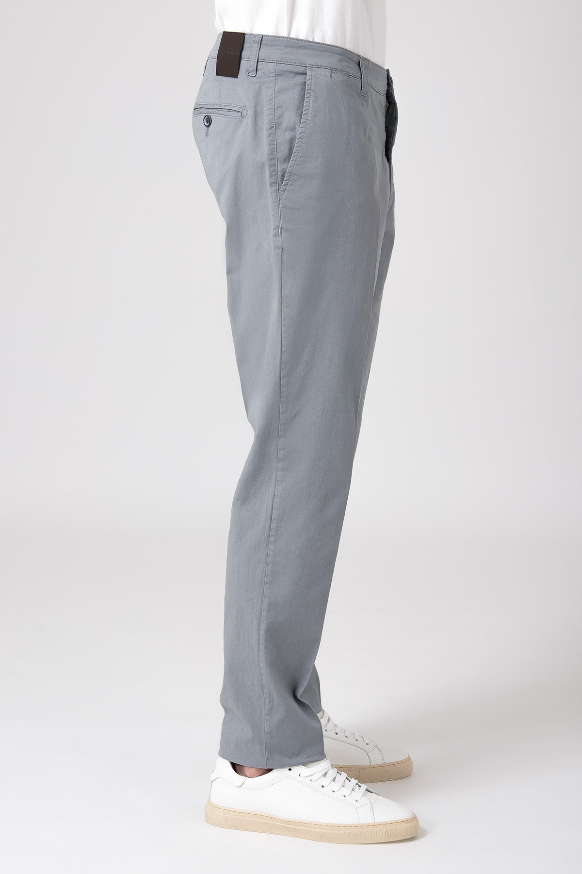Man wearing gray stretch cotton pants side view