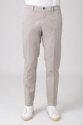 Man wearing sand color stretch cotton pants front view