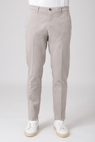 Man wearing sand color stretch cotton pants front view