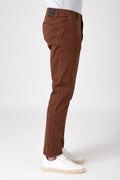 Man wearing cotton stretch pants in earth tone right side view