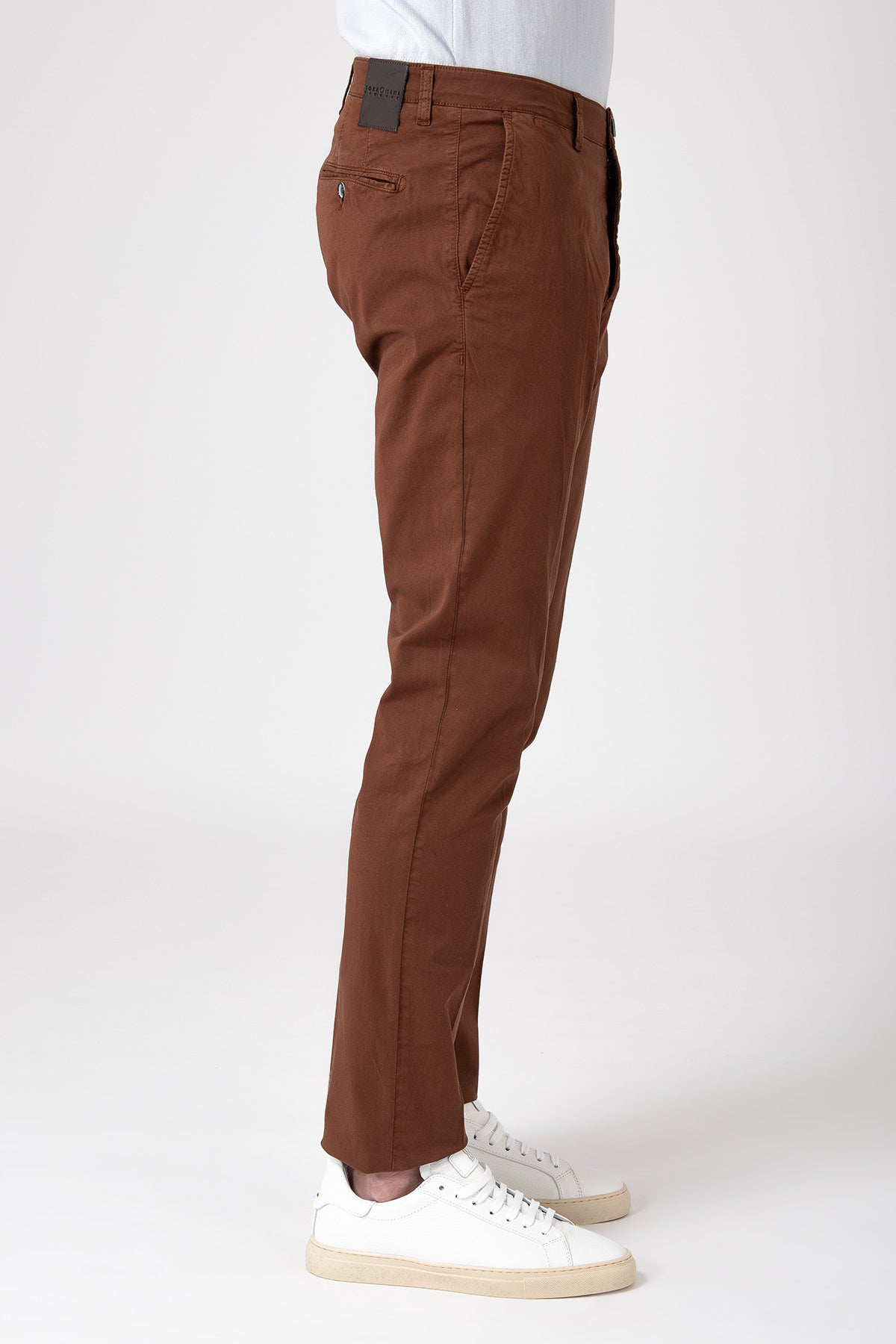 Man wearing cotton stretch pants in earth tone right side view