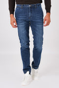 Medium-wash denim trousers with slant pockets on a model, front view