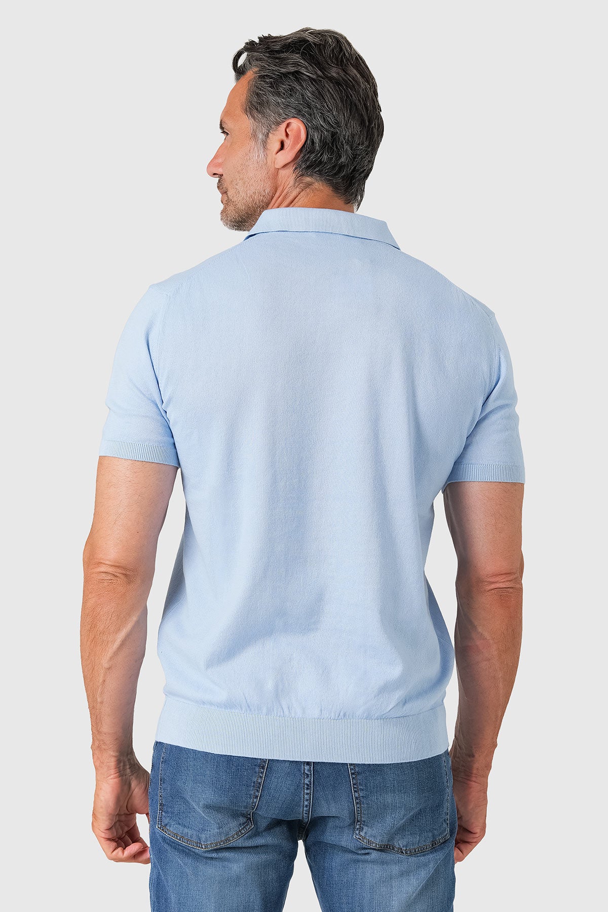 Short-sleeve cotton polo in blue - rear view