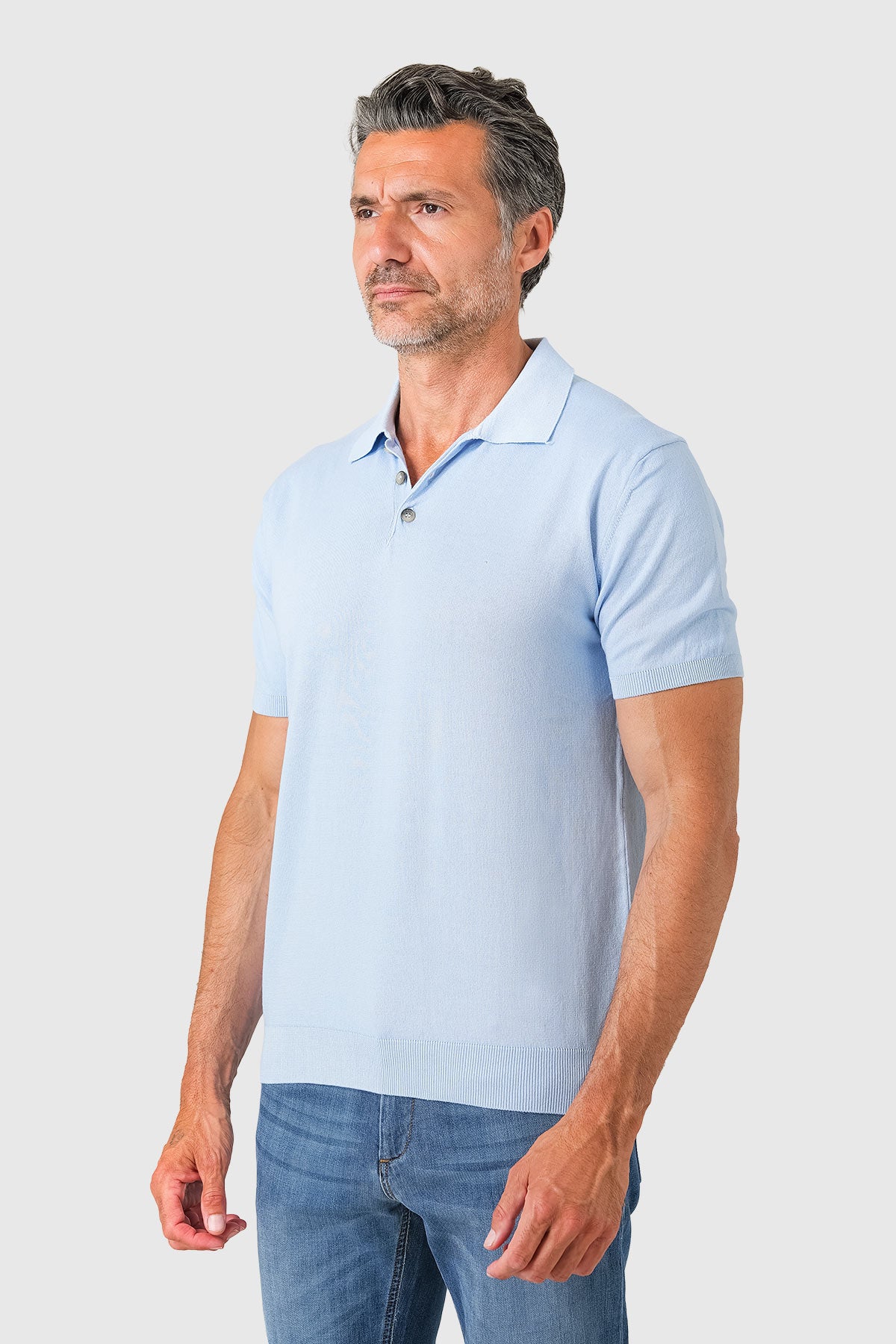 Short-sleeve cotton polo in light blue, side view