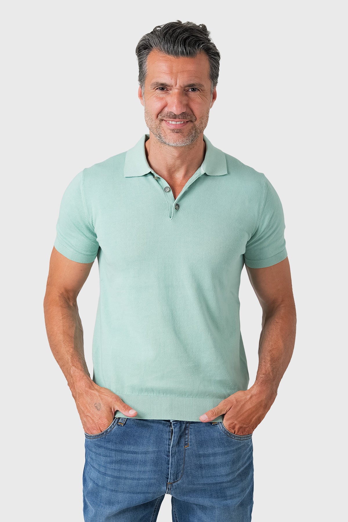 Short-sleeve cotton polo in sage green - front view