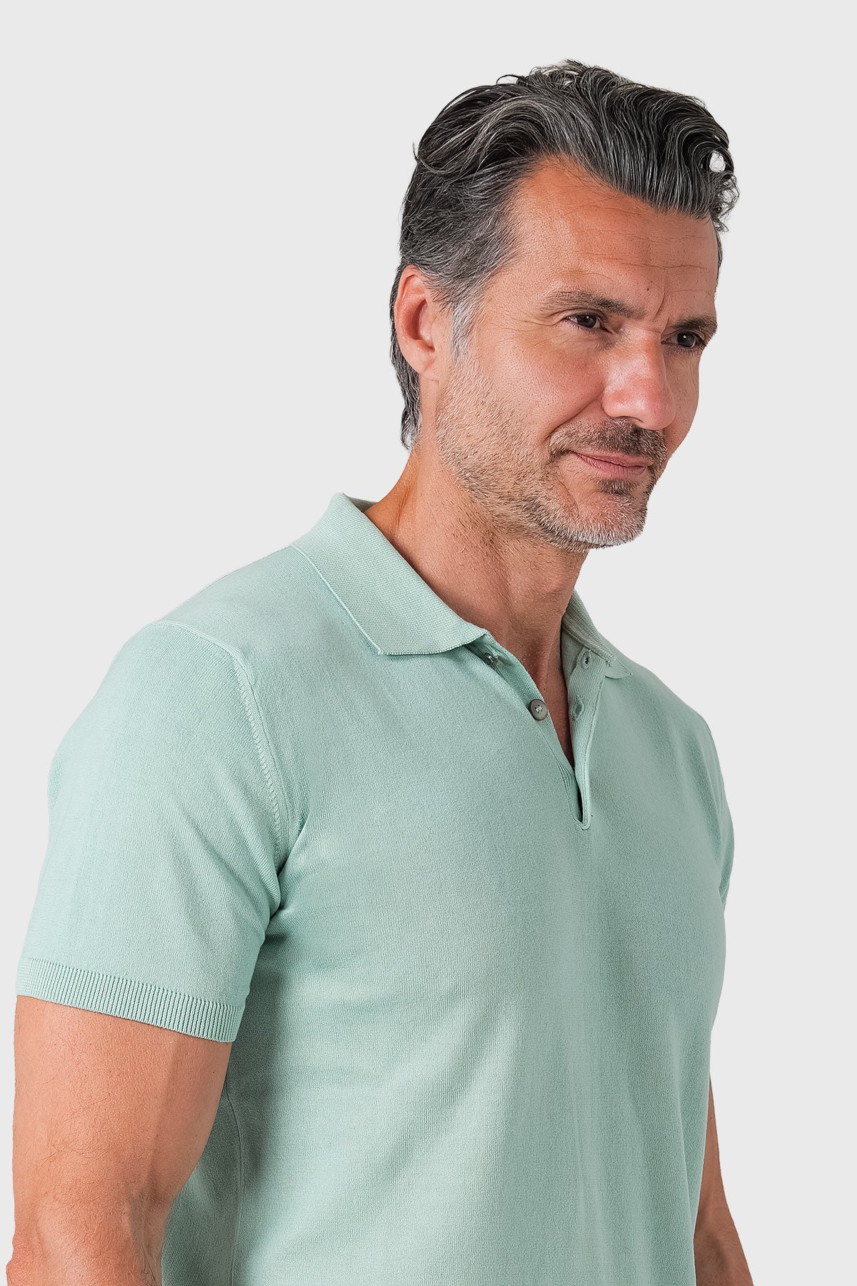 Short-sleeve cotton polo in sage green - side view