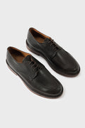 Pair of dark brown leather Norwegian derby shoes, three-quarter view