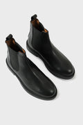 Pair of black leather Chelsea boots with elasticated side panels