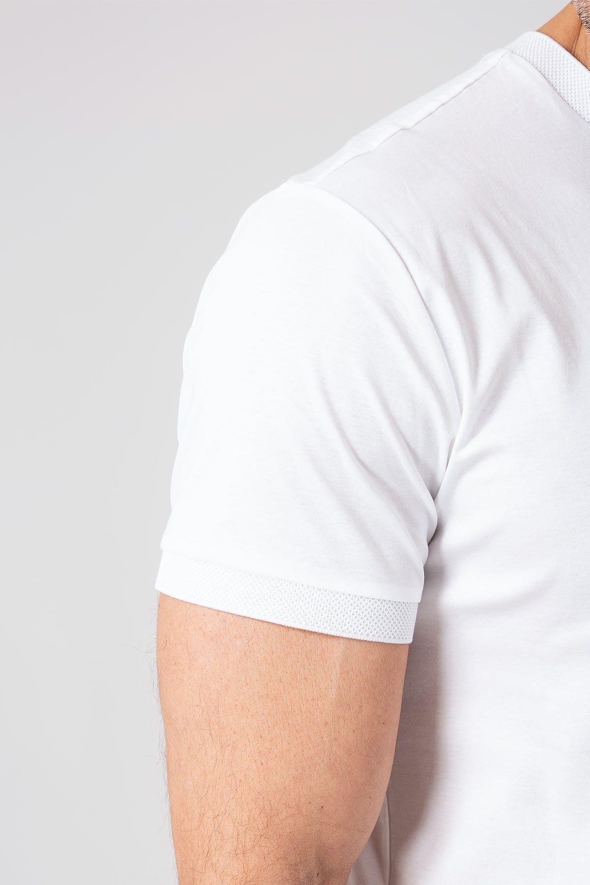 White mercerized cotton T-shirt worn, side view with sleeve detail