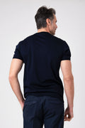 Man wearing navy blue mercerized cotton t-shirt back view