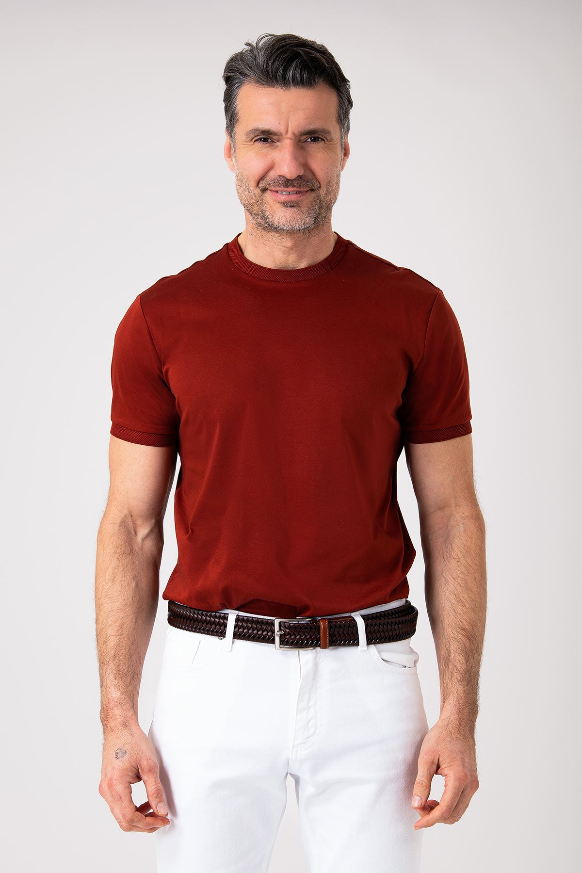 Man wearing a brick colored mercerized cotton T-shirt front view