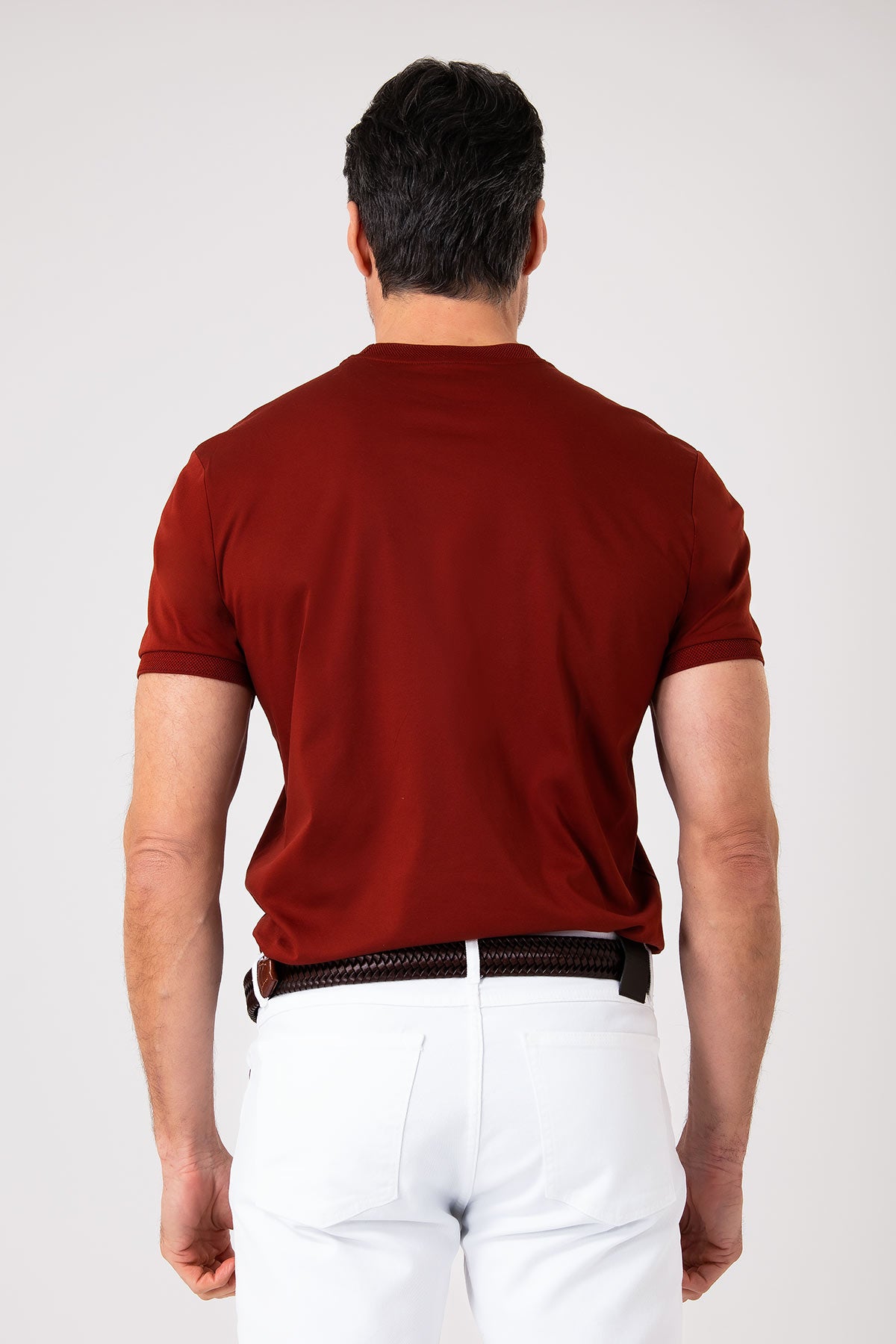 Back view of man wearing brick colored mercerized cotton t-shirt
