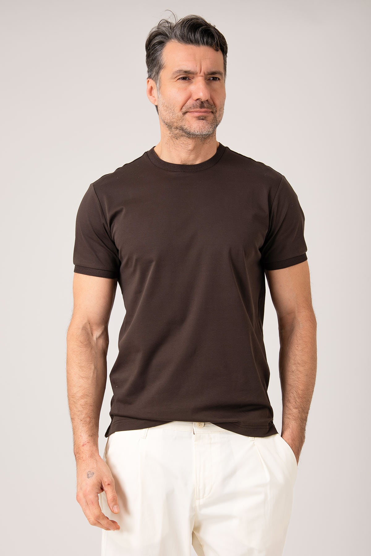 Man wearing dark mercerized cotton t-shirt front view
