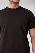 Man wearing black mercerized cotton T-shirt with ribbed collar front view